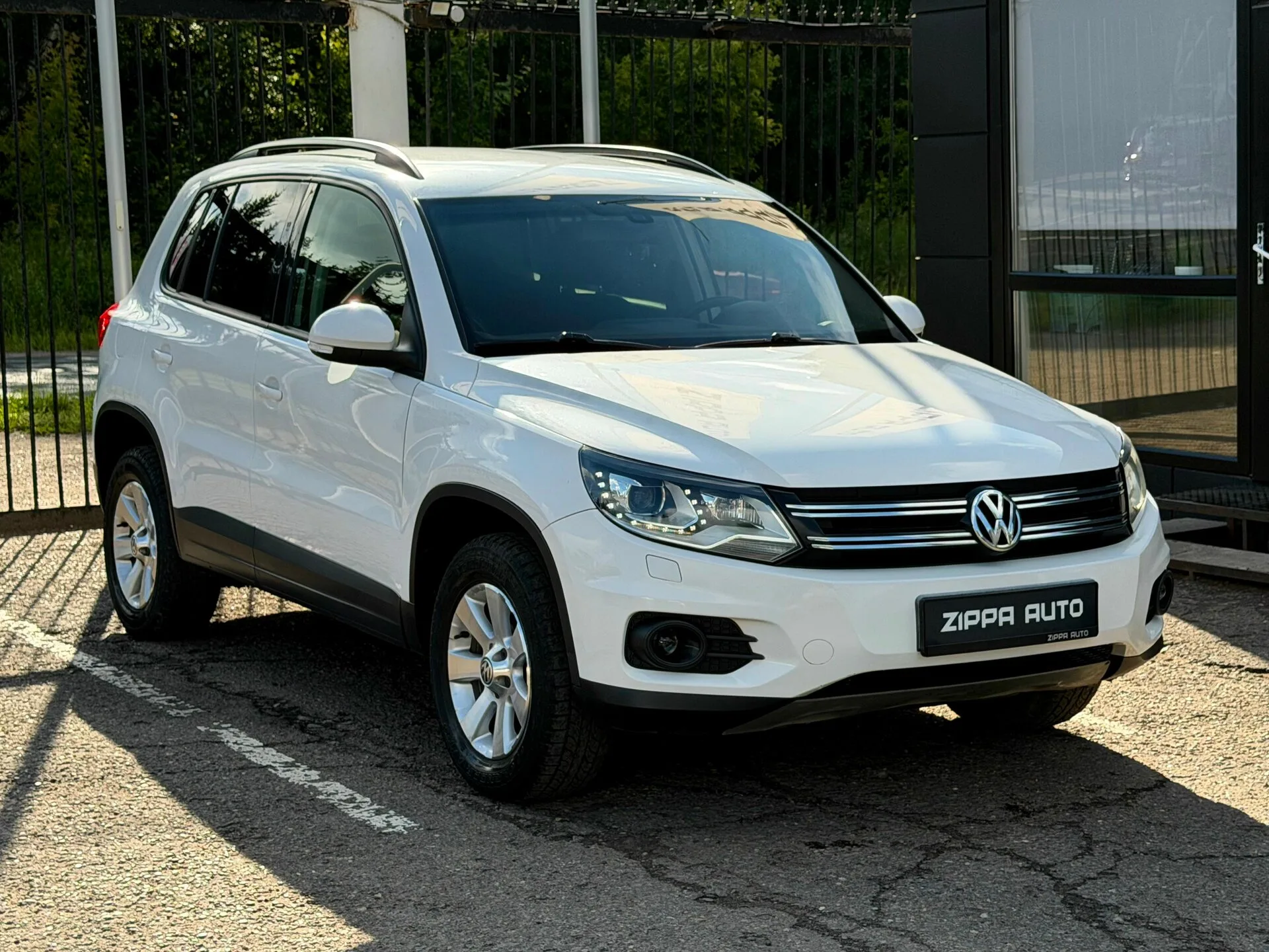 Volkswagen, Tiguan, 2.0 л., АТ, 2012 г., 235 435 км, фото 1