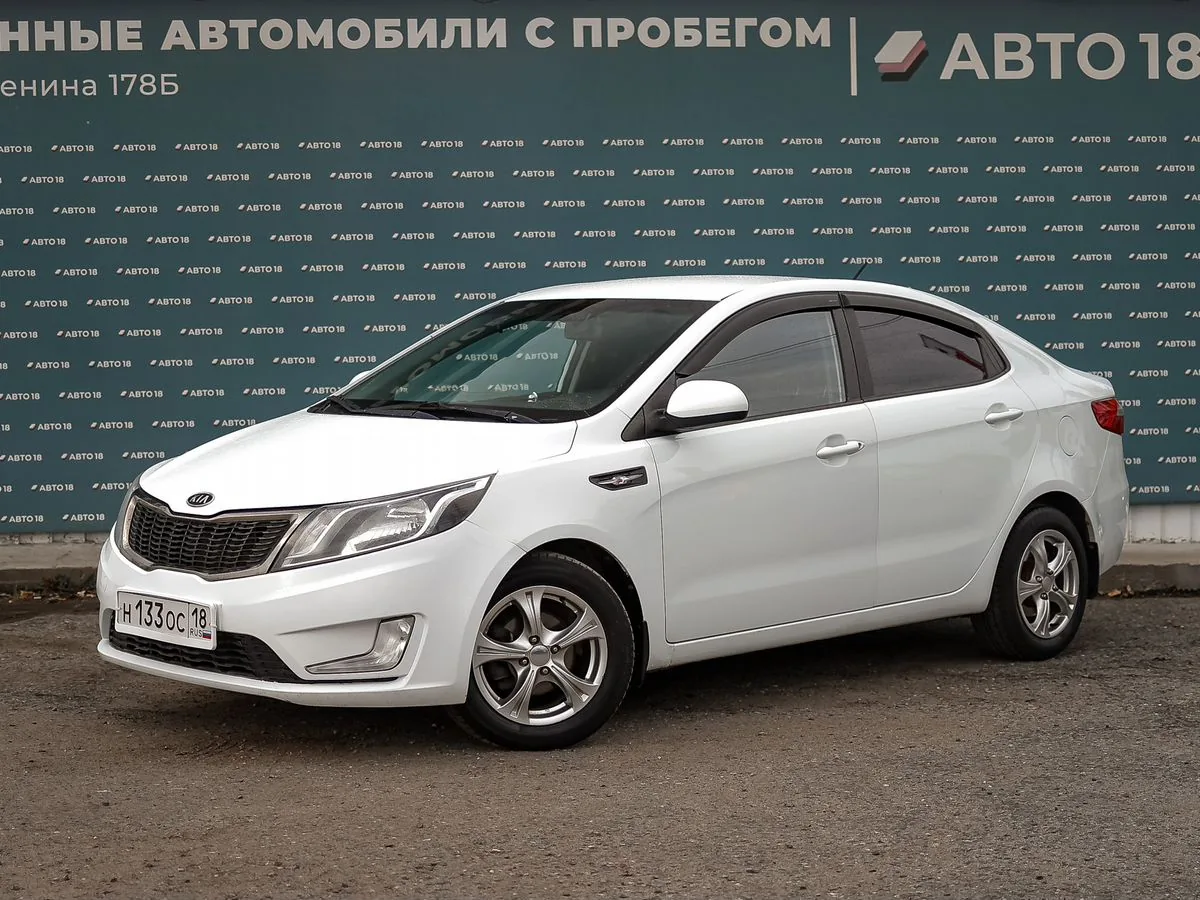Kia Rio 1.4 AT (107 л.с.), 2012, фото 1