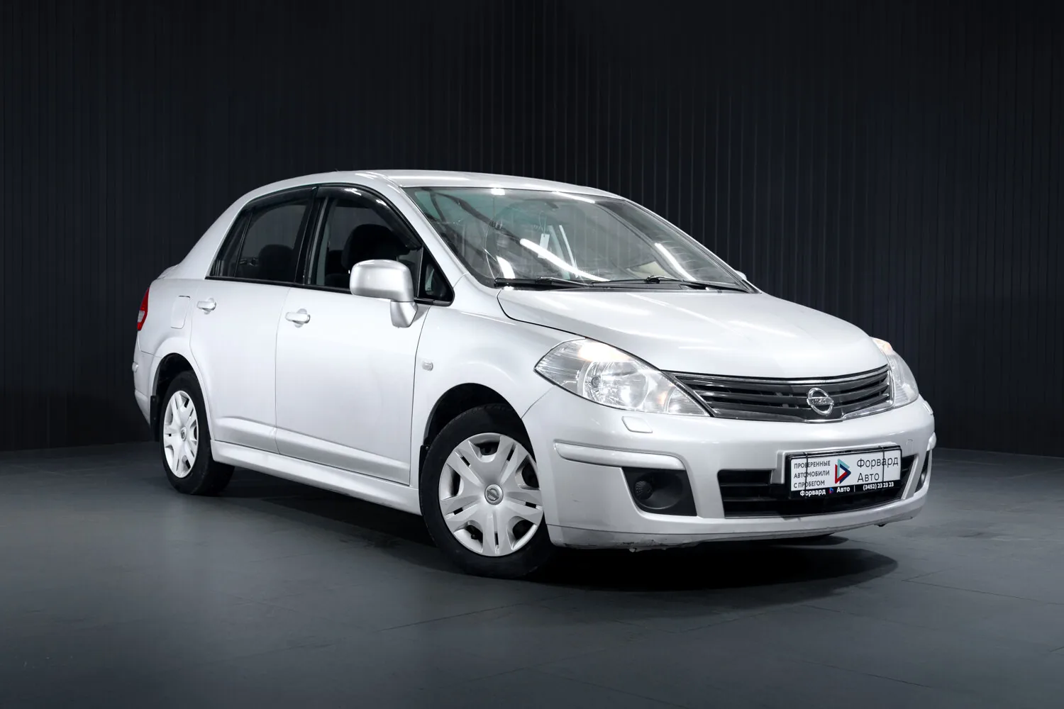 Nissan Tiida 1.6 AT (110 л.с.), 2010, фото 1