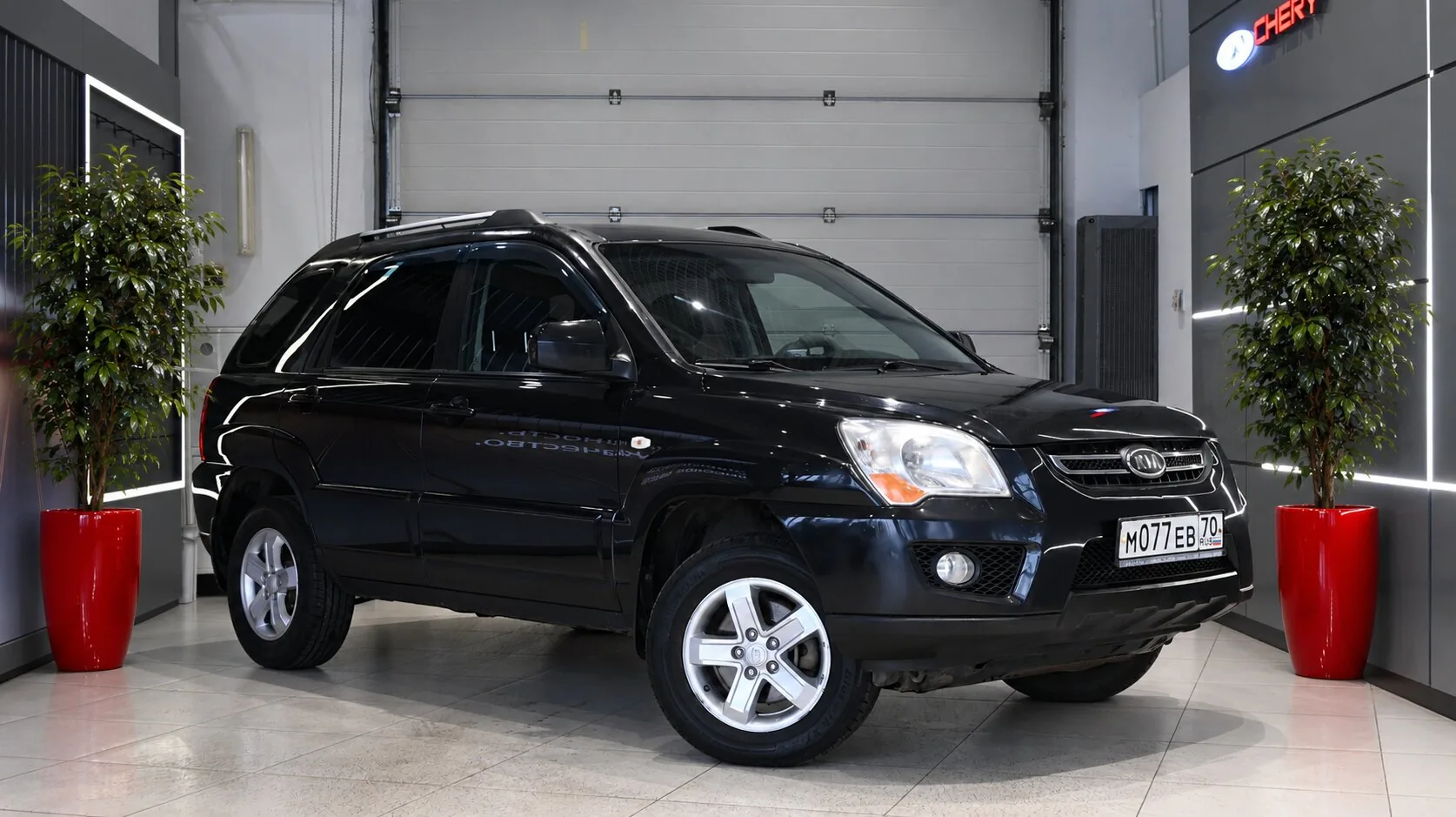 Kia Sportage 2.0 MT (141 л.с.), 2009, фото 1