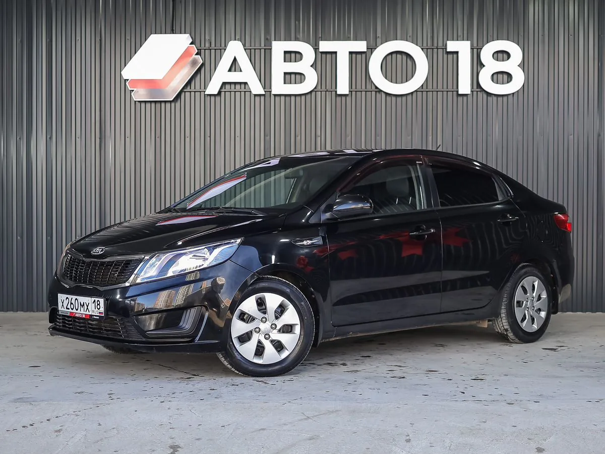 Kia Rio 1.4 MT (107 л.с.), 2013, фото 1