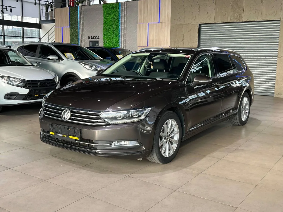 Volkswagen Passat 1.4 AT (150 л.с.), 2015, фото 1