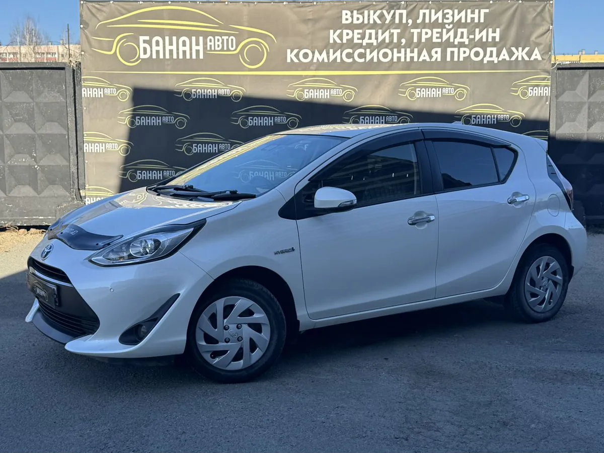 Toyota Aqua 1.5hyb CVT (100 л.с.), 2018, фото 1