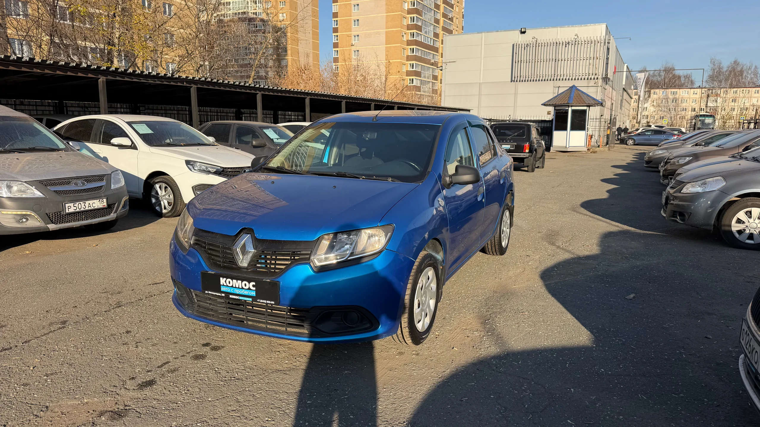 Renault Logan 1.6 MT (82 л.с.), 2015, фото 1