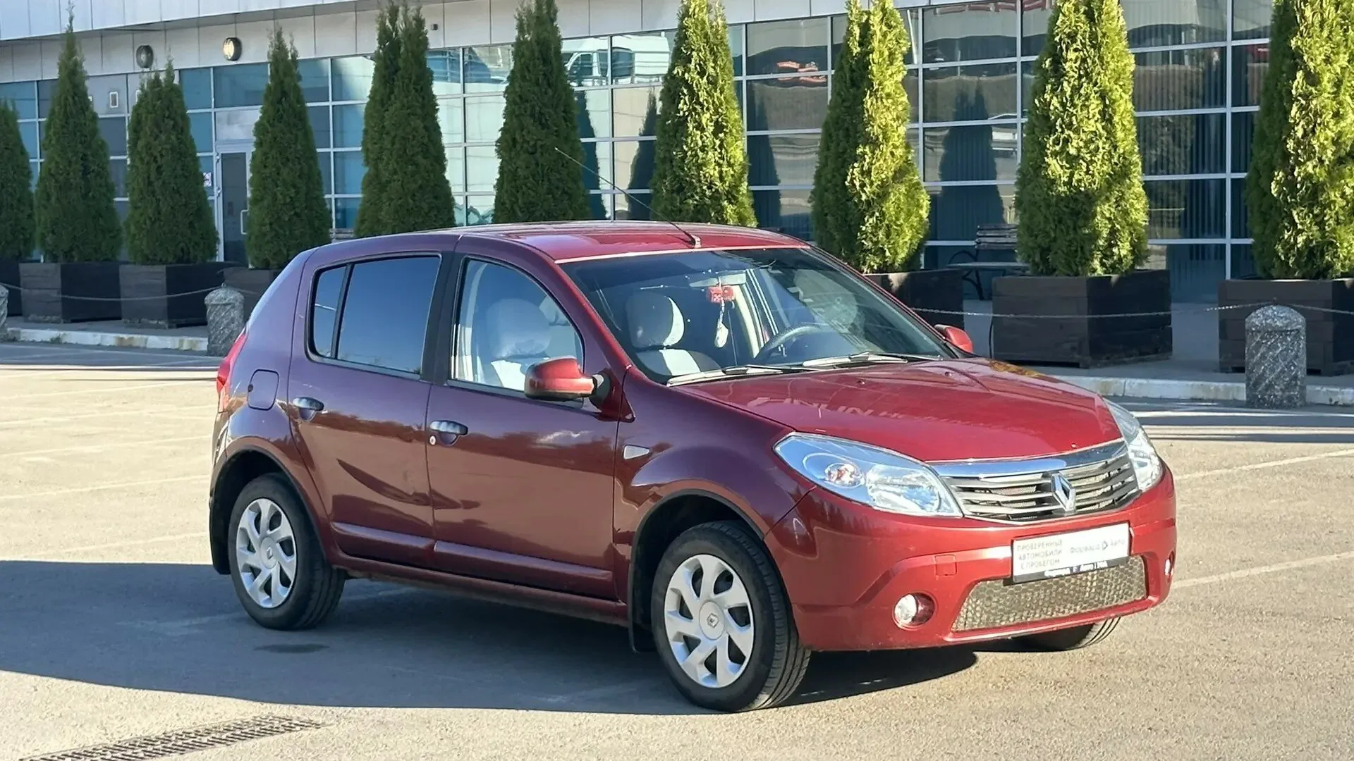 Renault Sandero 1.6 MT (103 л.с.), 2011, фото 1